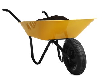Photo of Yellow wheelbarrow with soil isolated on white. Gardening tool