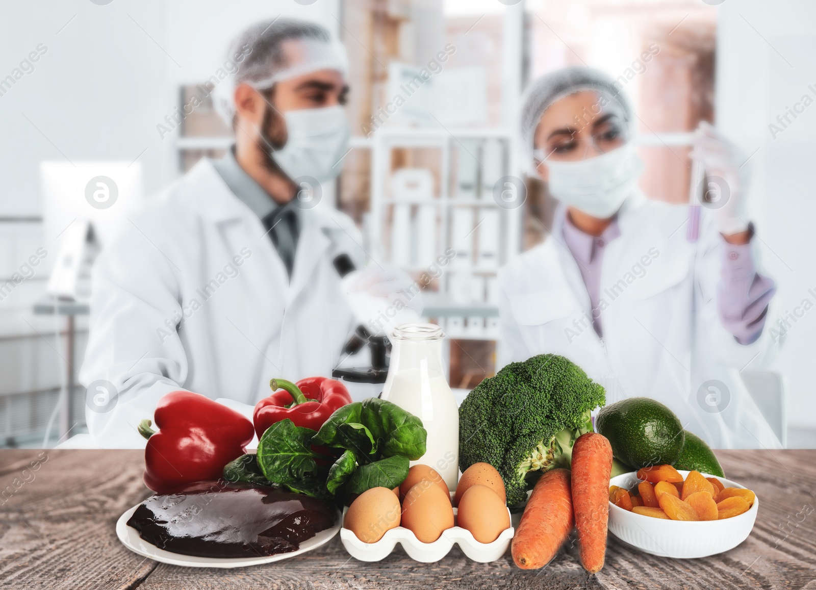 Image of Scientists inspecting products in laboratory. Food quality control 