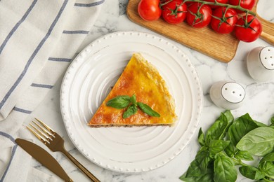 Piece of delicious pie with minced meat on white marble table, flat lay