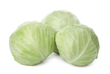 Photo of Whole fresh ripe cabbages on white background