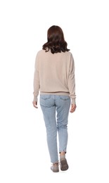 Photo of Woman in casual outfit walking on white background, back view
