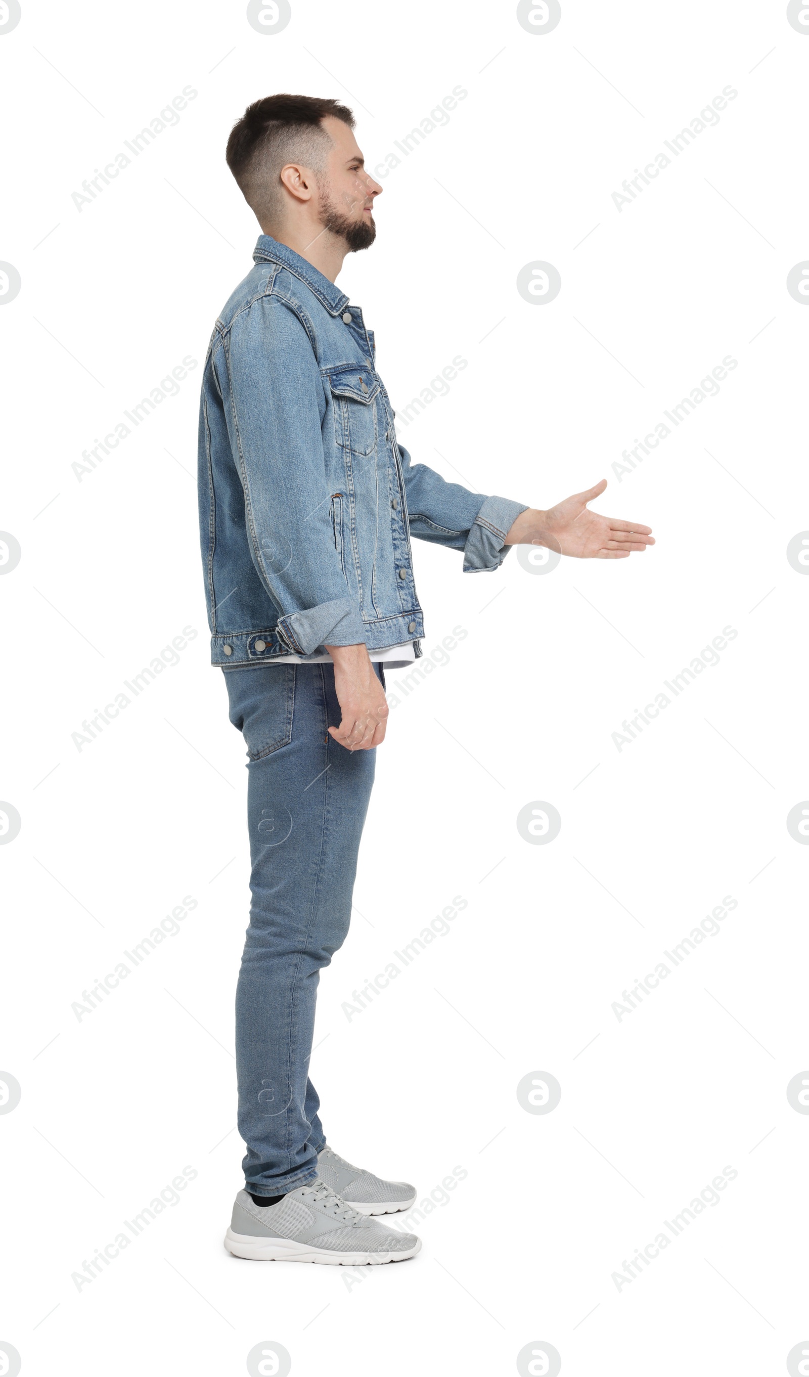 Photo of Man in denim clothes isolated on white