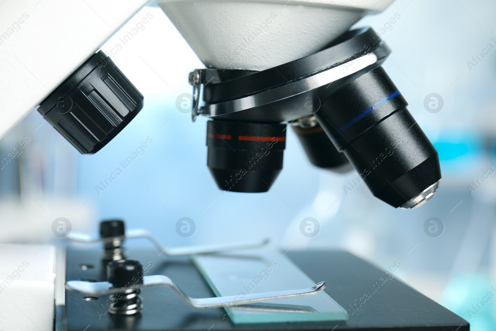 Photo of Closeup view of modern microscope in laboratory. Medical equipment