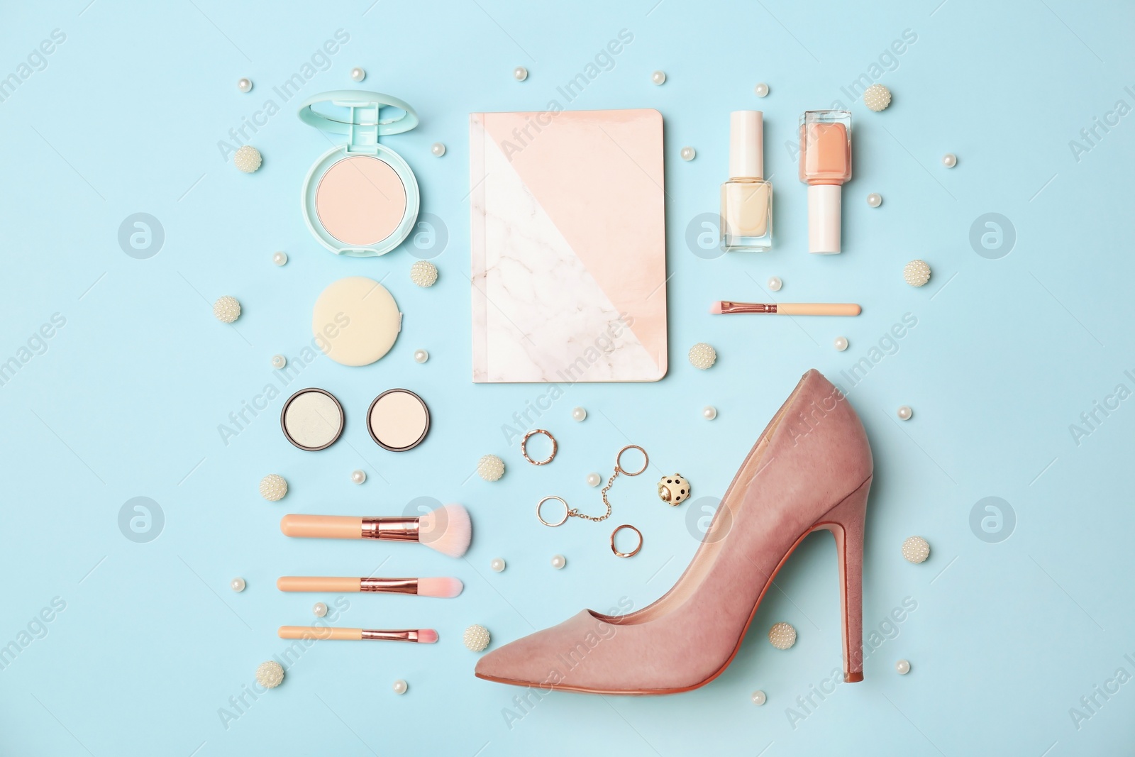 Photo of Flat lay composition with cosmetics and stylish accessories on color background