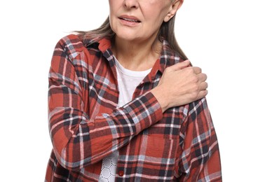 Arthritis symptoms. Woman suffering from pain in shoulder on white background, closeup