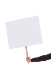 Photo of Woman holding blank sign on white background, closeup