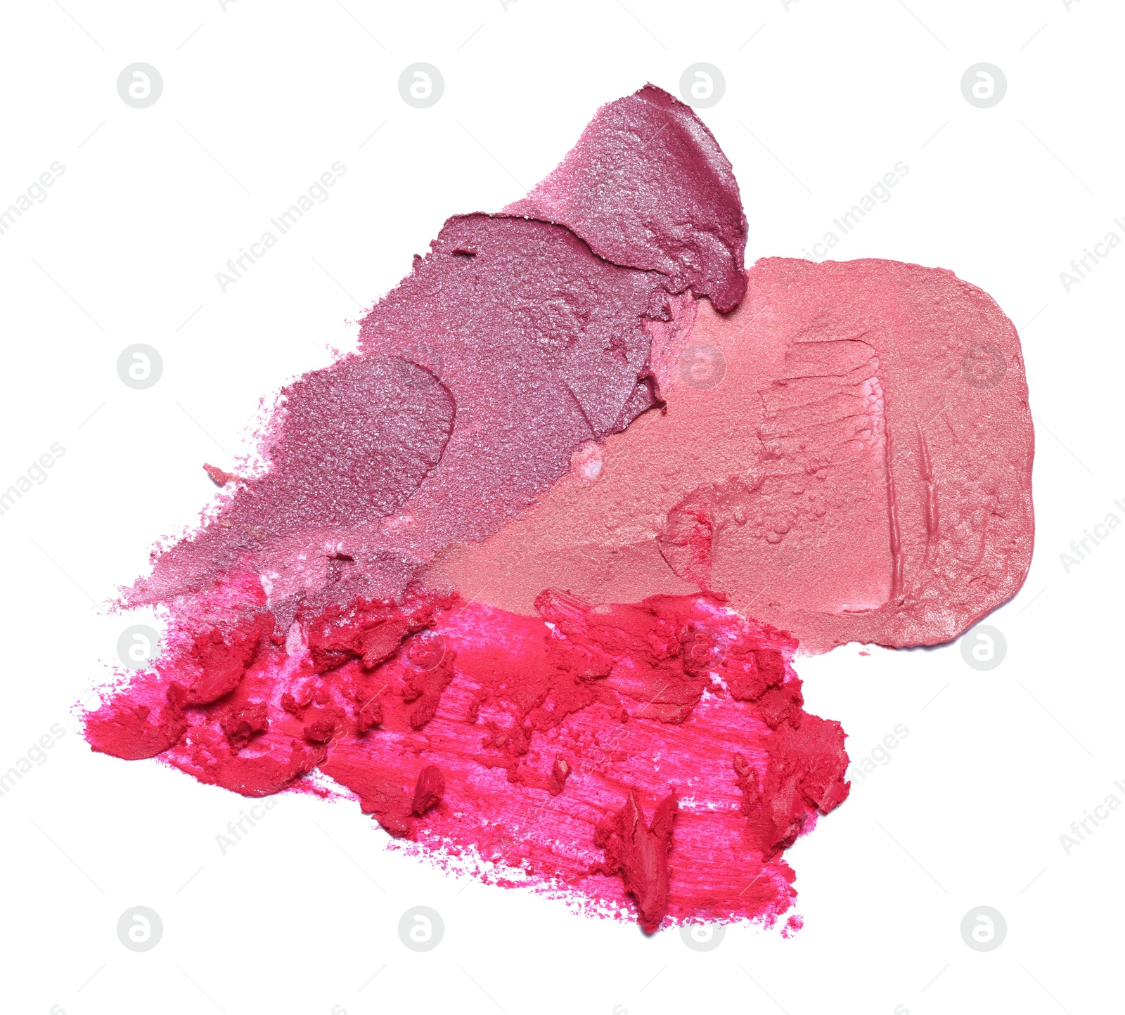 Photo of Smears of bright lipsticks on white background, top view