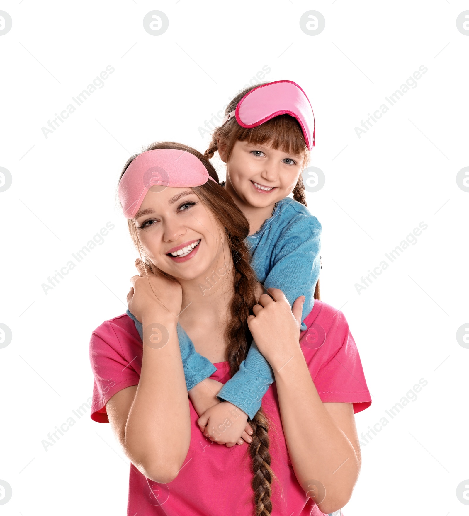 Photo of Happy woman and daughter in pajamas on white background