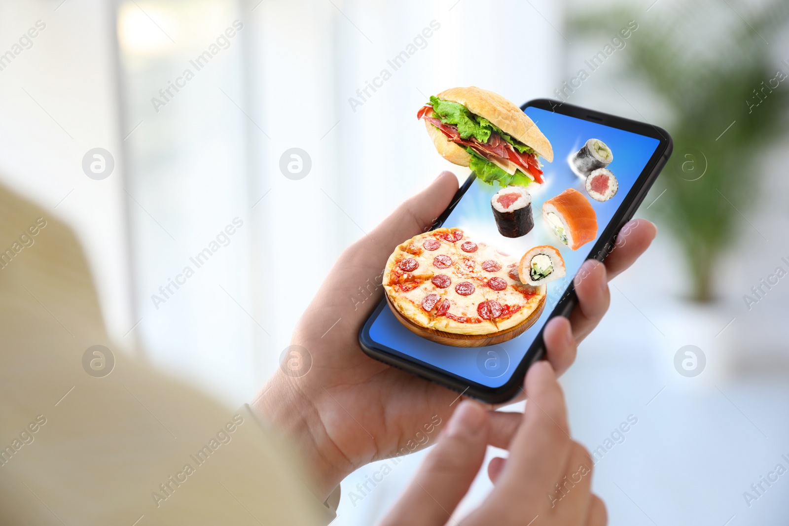 Image of Woman using smartphone for ordering food online, closeup. Delivery service during quarantine