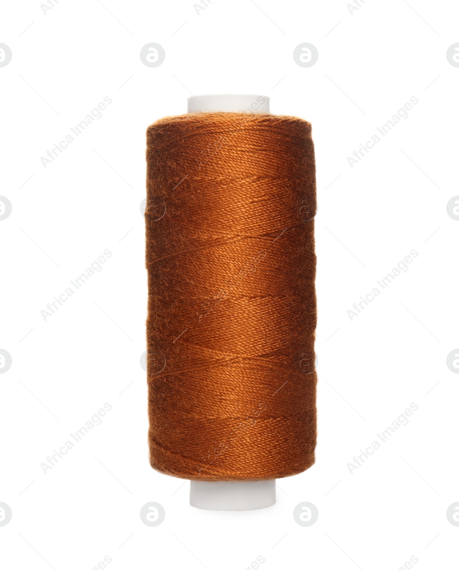 Photo of Spool of dark orange sewing thread isolated on white