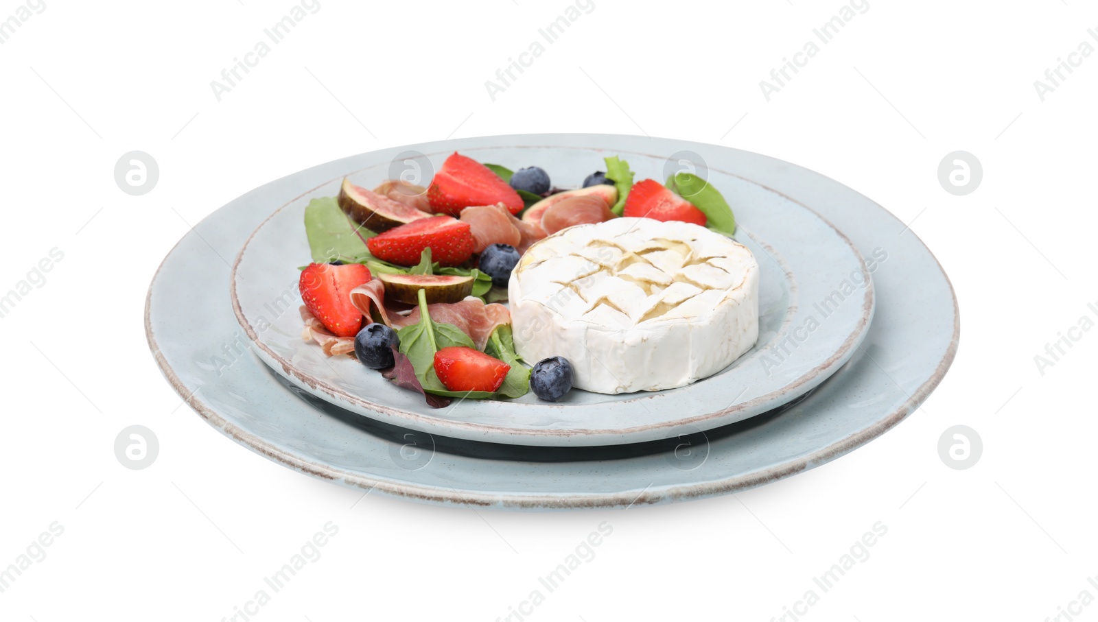 Photo of Delicious salad with brie cheese, prosciutto, strawberries and blueberries on white background