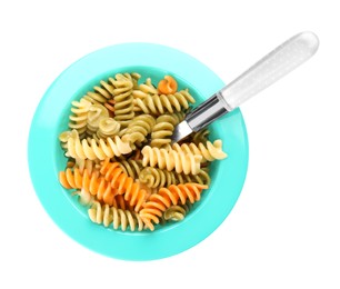 Photo of Bowl with tasty fusilli pasta on white background, top view