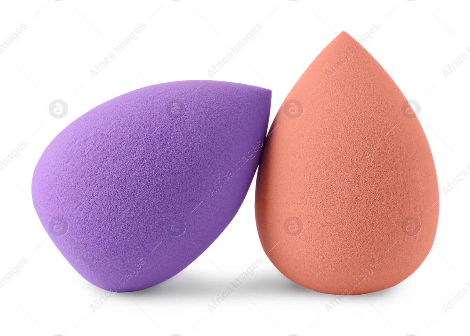 Photo of Two different make up sponges isolated on white