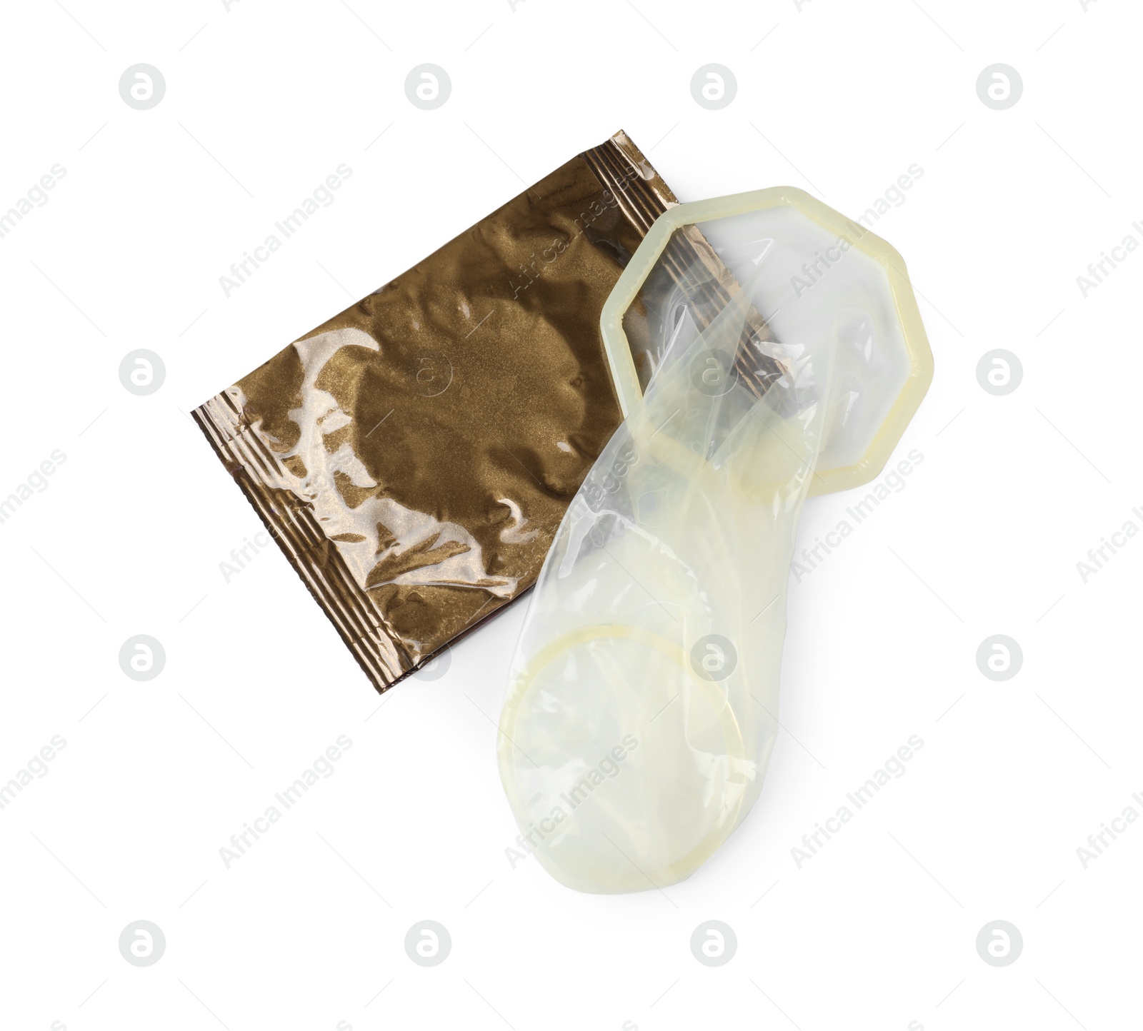 Photo of Unrolled female condom and package isolated on white, top view. Safe sex