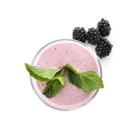 Photo of Tasty milk shake with blackberries and mint isolated on white