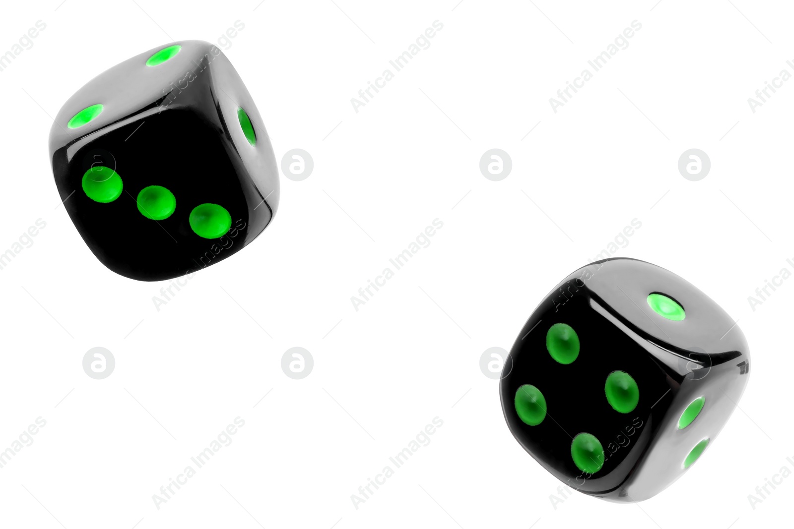 Image of Two black dice in air on white background