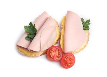 Photo of Delicious sandwiches with boiled sausage, cheese and tomato isolated on white, top view
