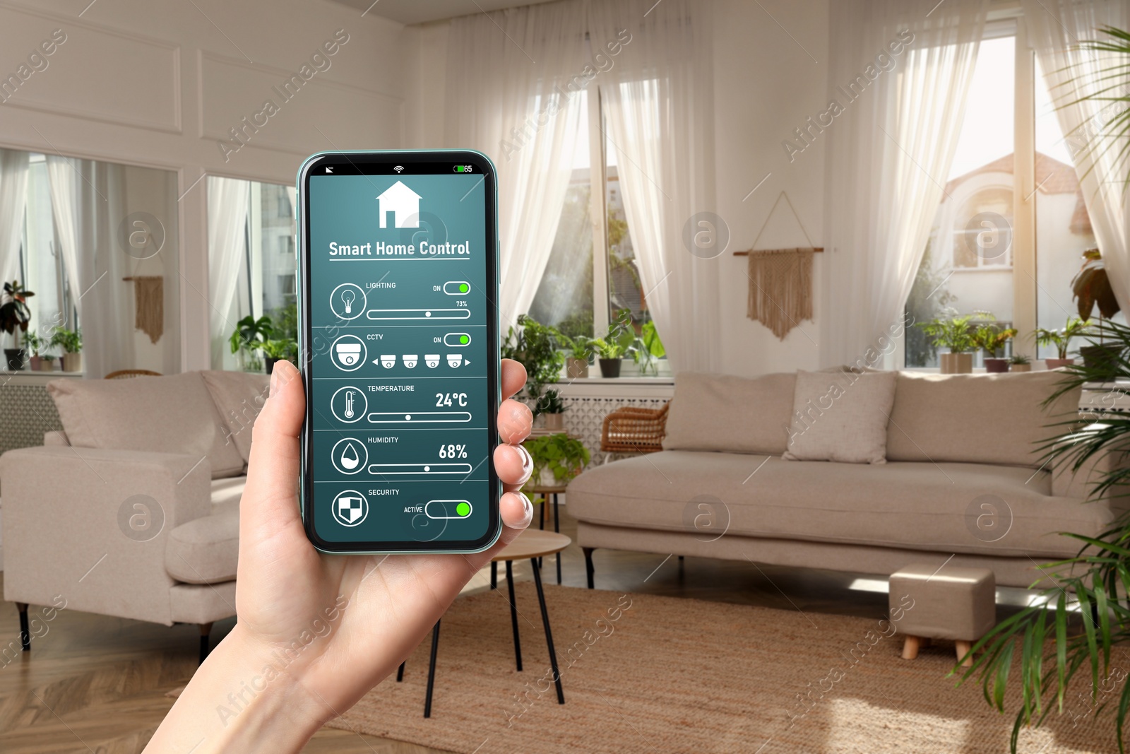 Image of Woman using smart home control system via application on mobile phone indoors, closeup