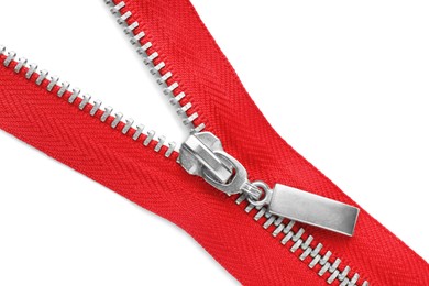 Photo of Red zipper on white background, top view