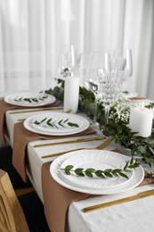 Photo of Stylish elegant table setting for festive dinner indoors