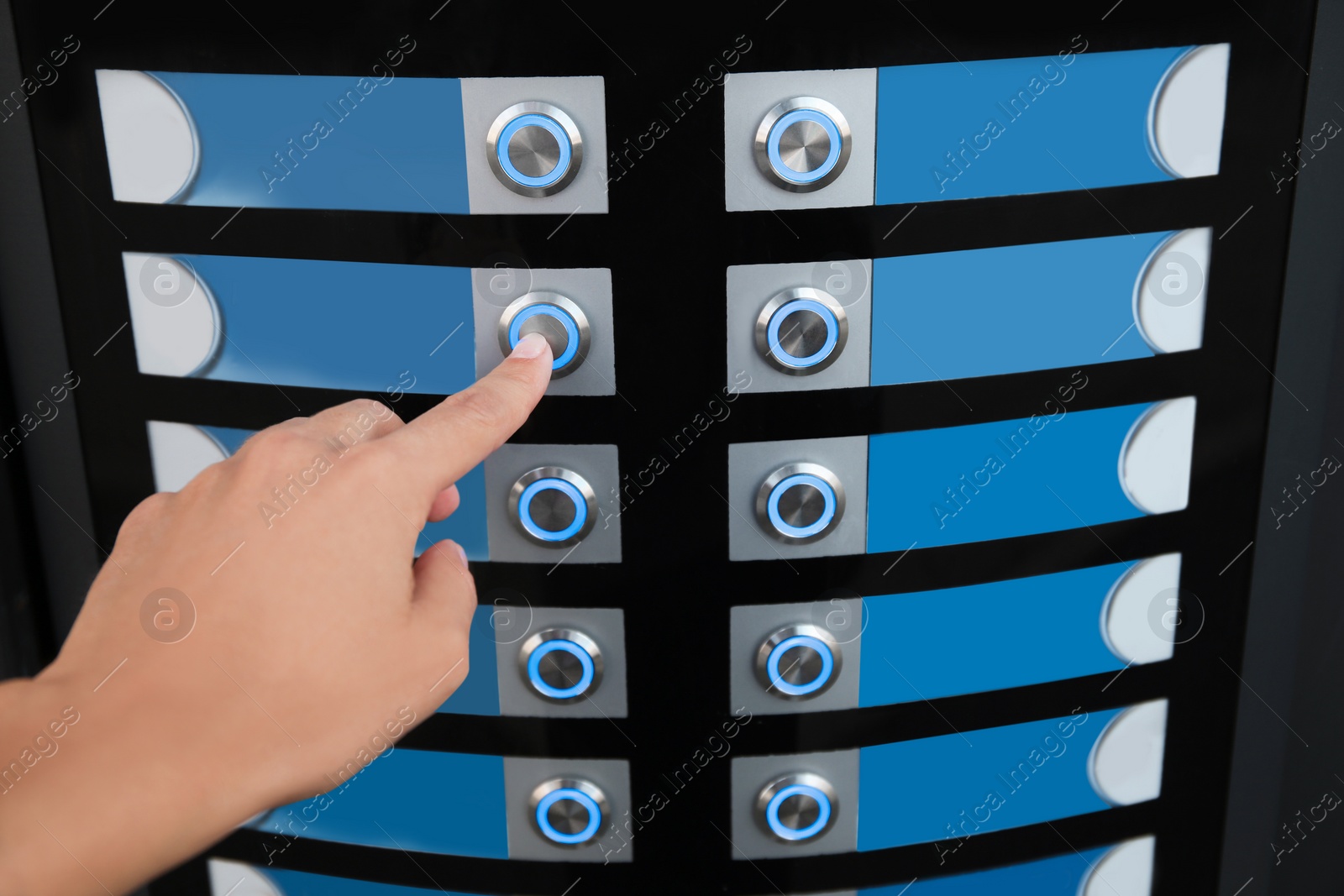 Photo of Woman choosing hot drink in coffee vending machine, closeup