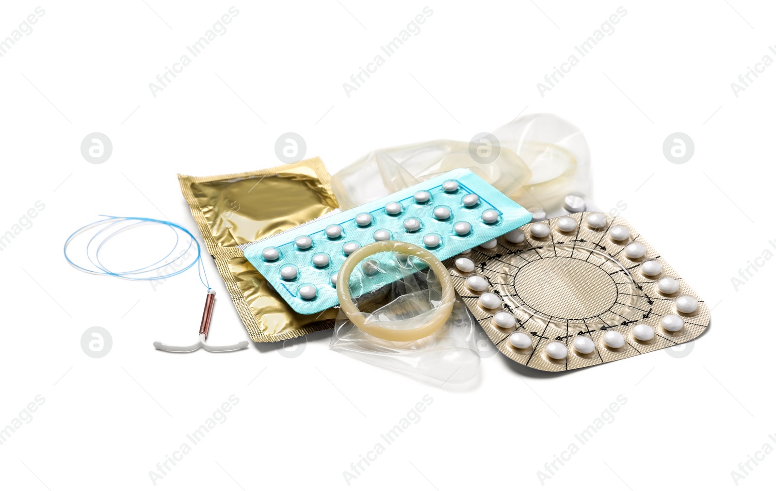 Photo of Contraceptive pills, condoms and intrauterine device isolated on white. Different birth control methods