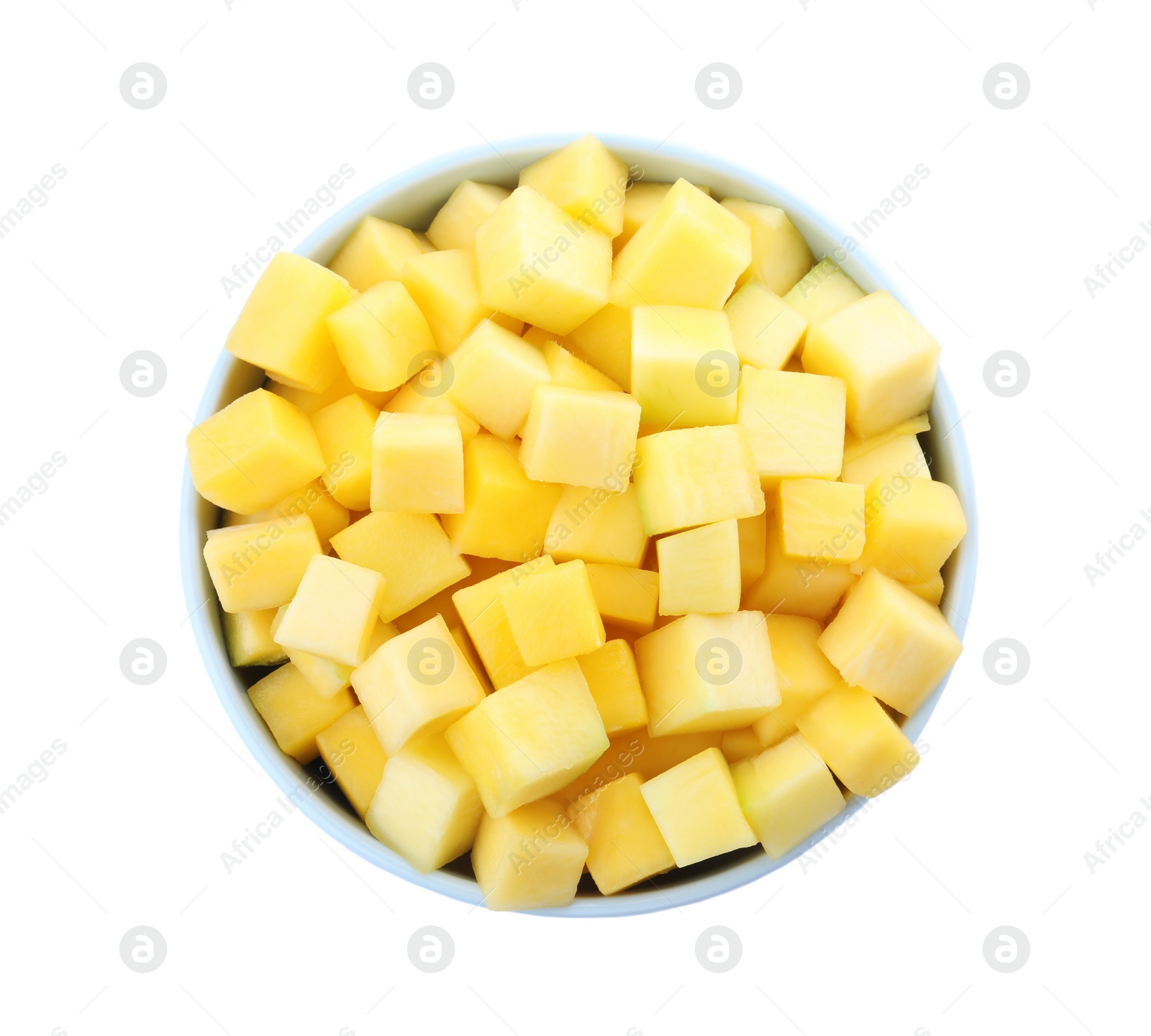 Photo of Tasty mango cubes in ceramic bowl isolated on white, top view