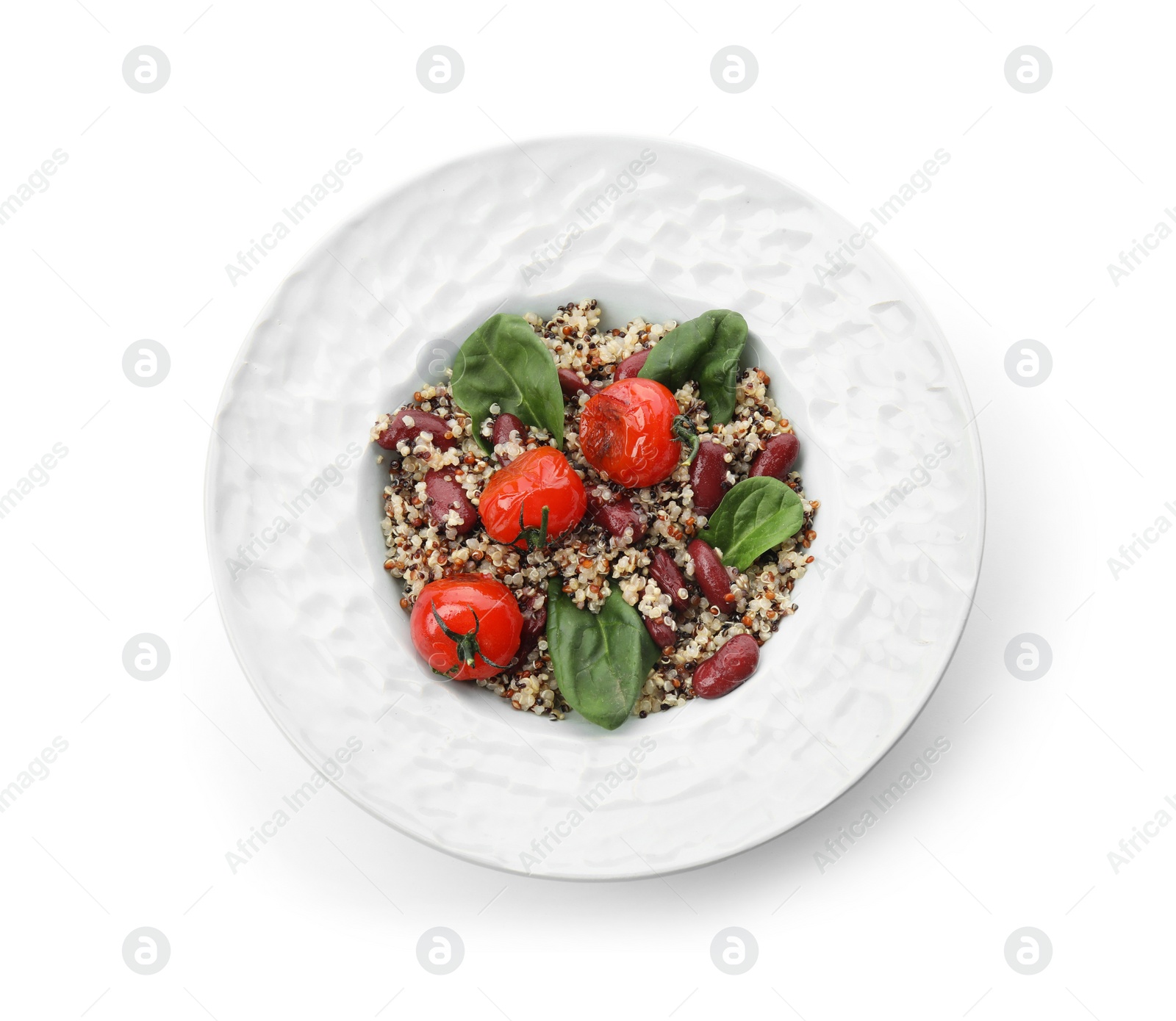 Photo of Plate of healthy quinoa salad with vegetables isolated on white, top view