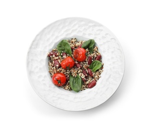 Photo of Plate of healthy quinoa salad with vegetables isolated on white, top view