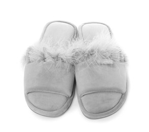 Photo of Pair of soft slippers with fur isolated on white