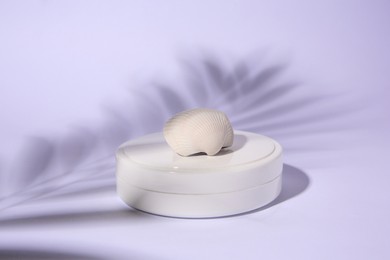 Photo of Cosmetic product, shell and shadow of tropical leaf on white background