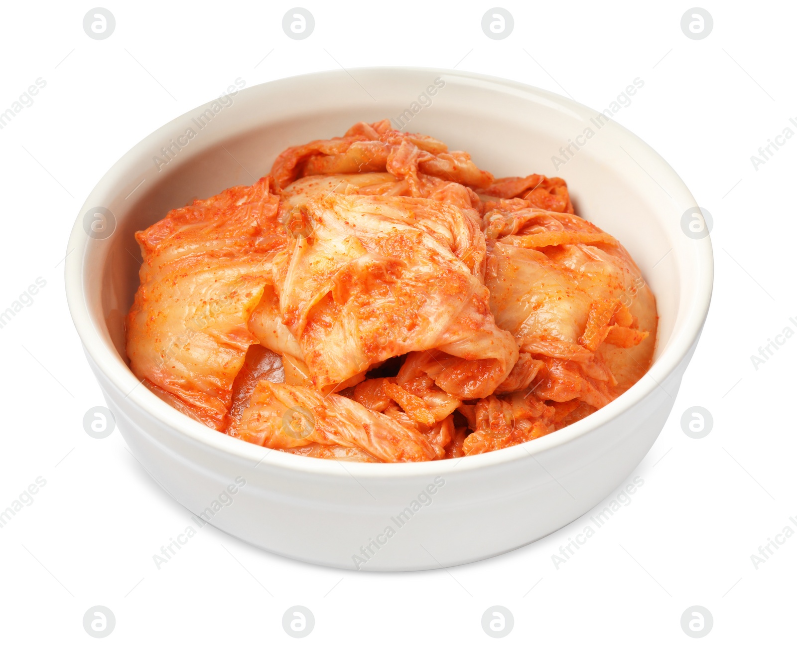 Photo of Bowl of spicy cabbage kimchi isolated on white