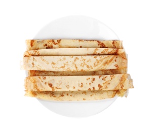 Photo of Tasty thin pancake rolls on plate against white background, top view