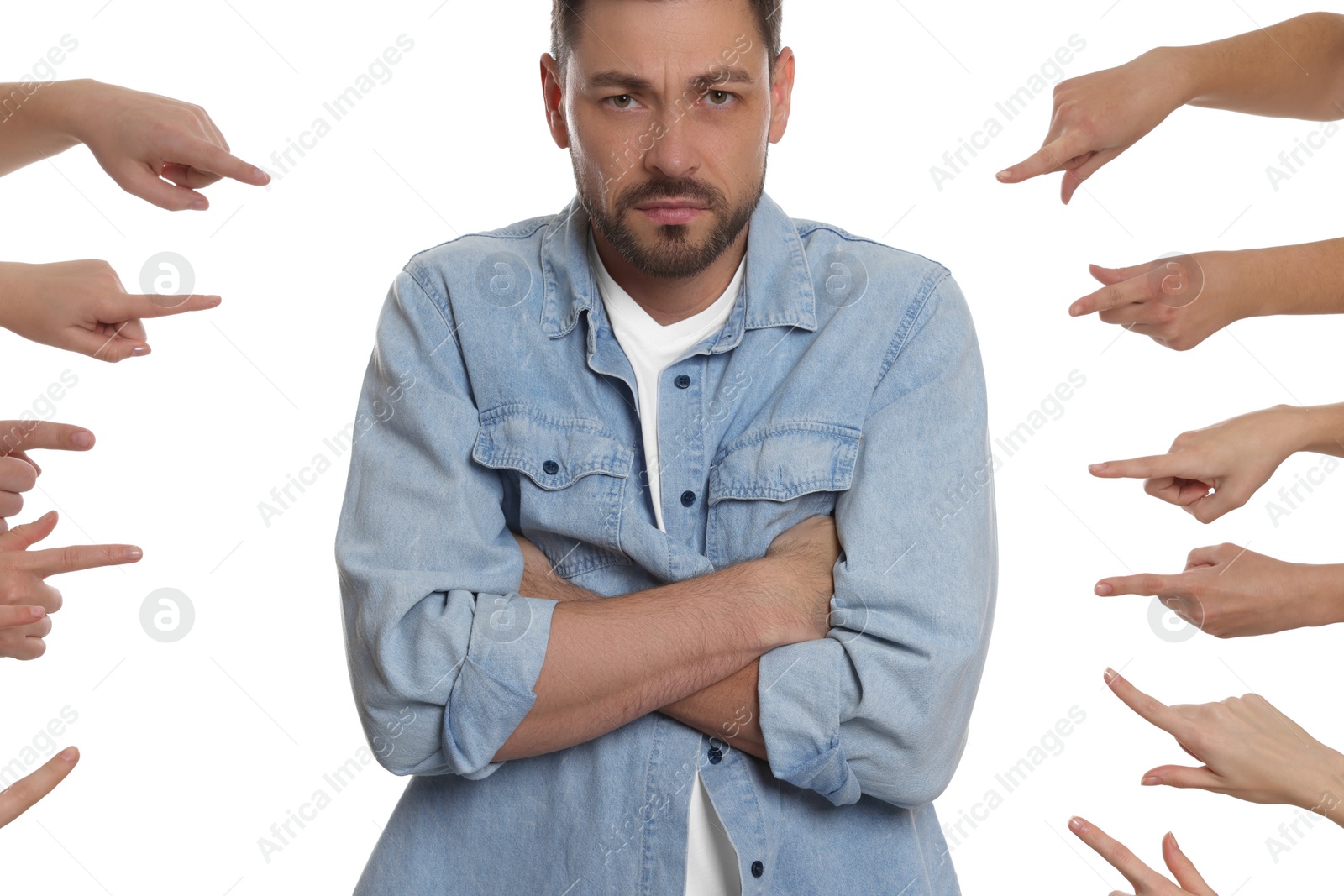 Photo of People bullying upset man on white background