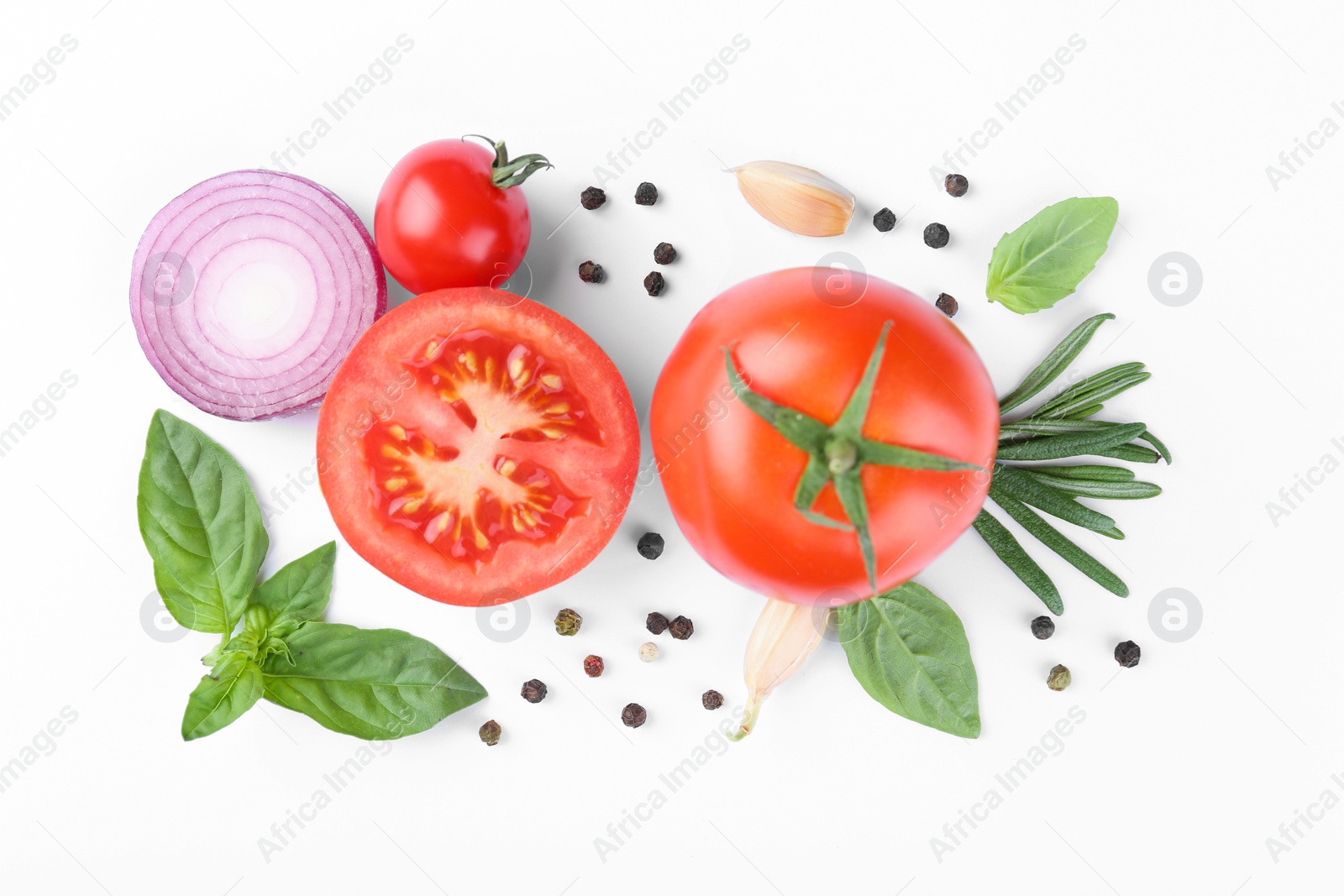 Photo of Flat lay composition with different whole and cut tomatoes on white background