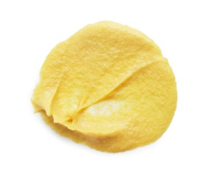 Photo of Smear of delicious mustard isolated on white, top view