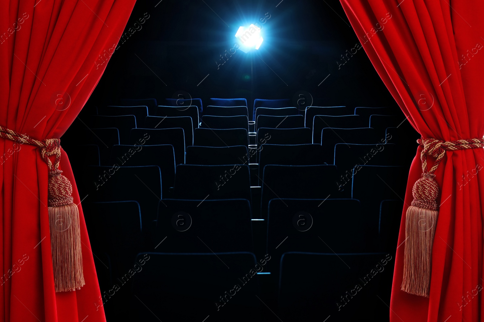 Image of Open elegant red front curtains and hall with empty seats on background