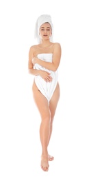 Photo of Full length portrait of young pretty woman with towels on white background