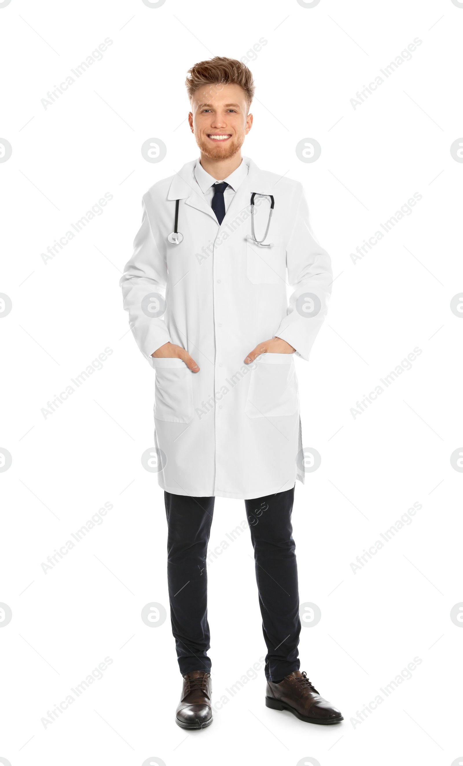 Photo of Full length portrait of medical doctor with stethoscope isolated on white