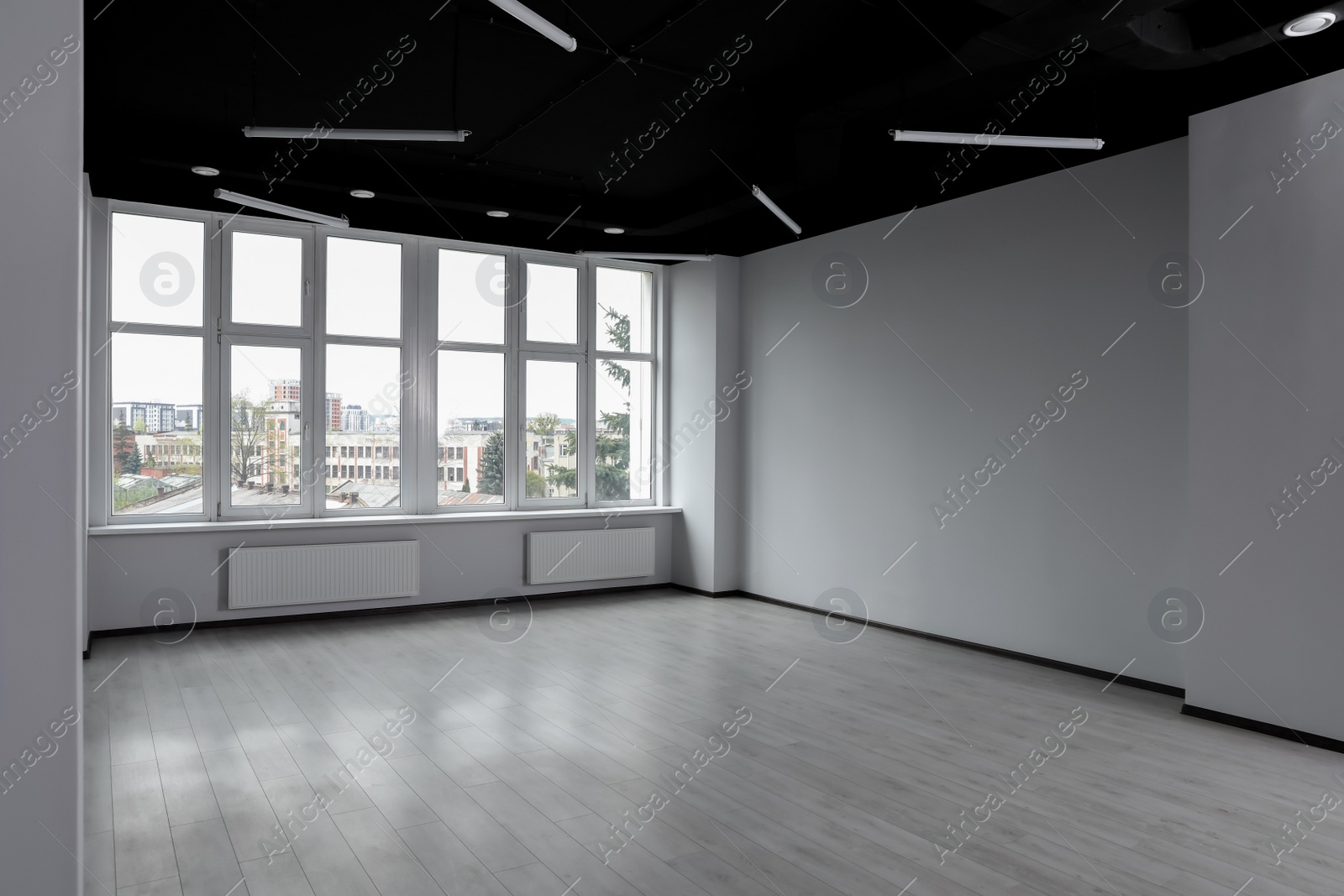 Photo of Modern office with white wall and window. Interior design