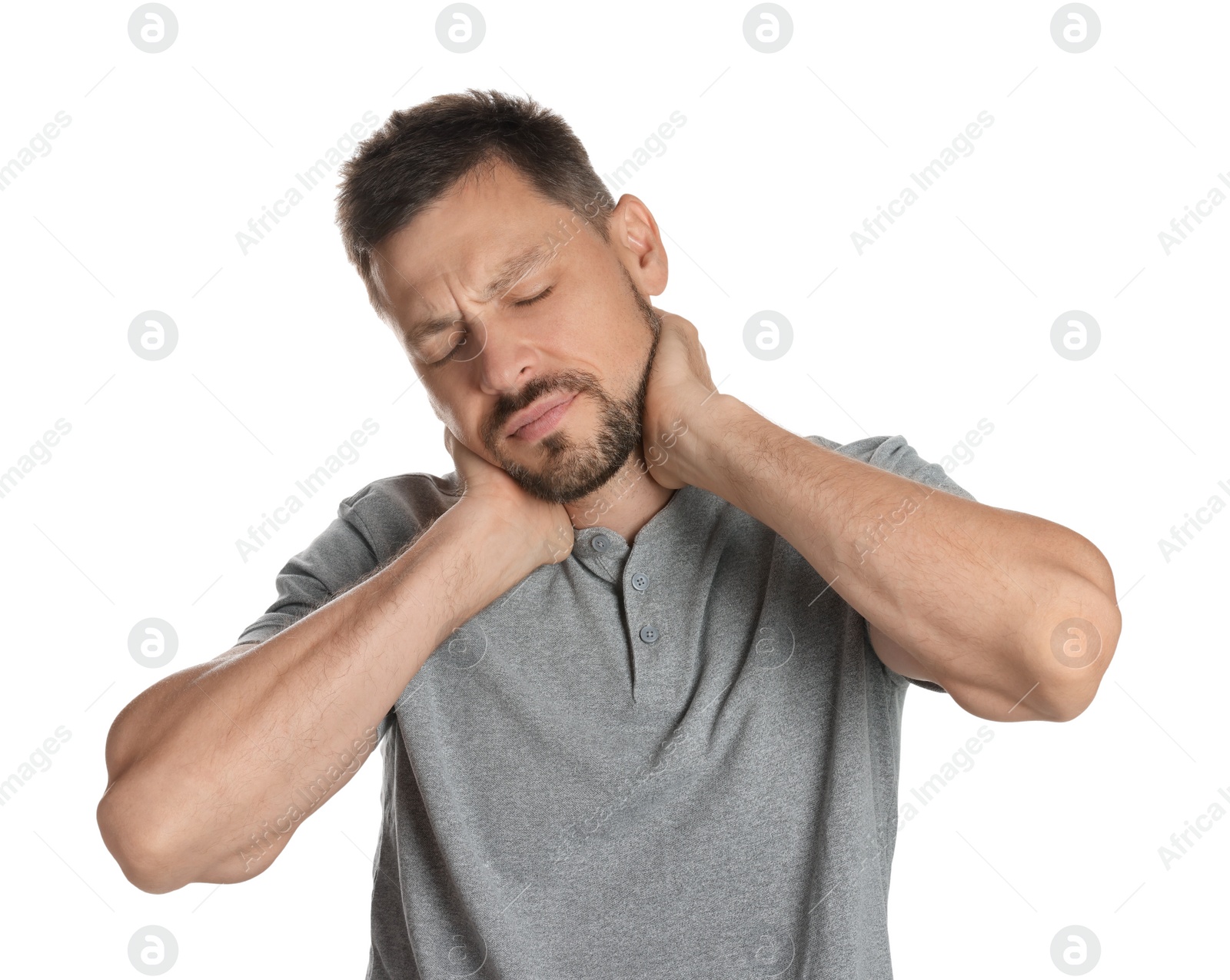 Photo of Man suffering from neck pain on white background