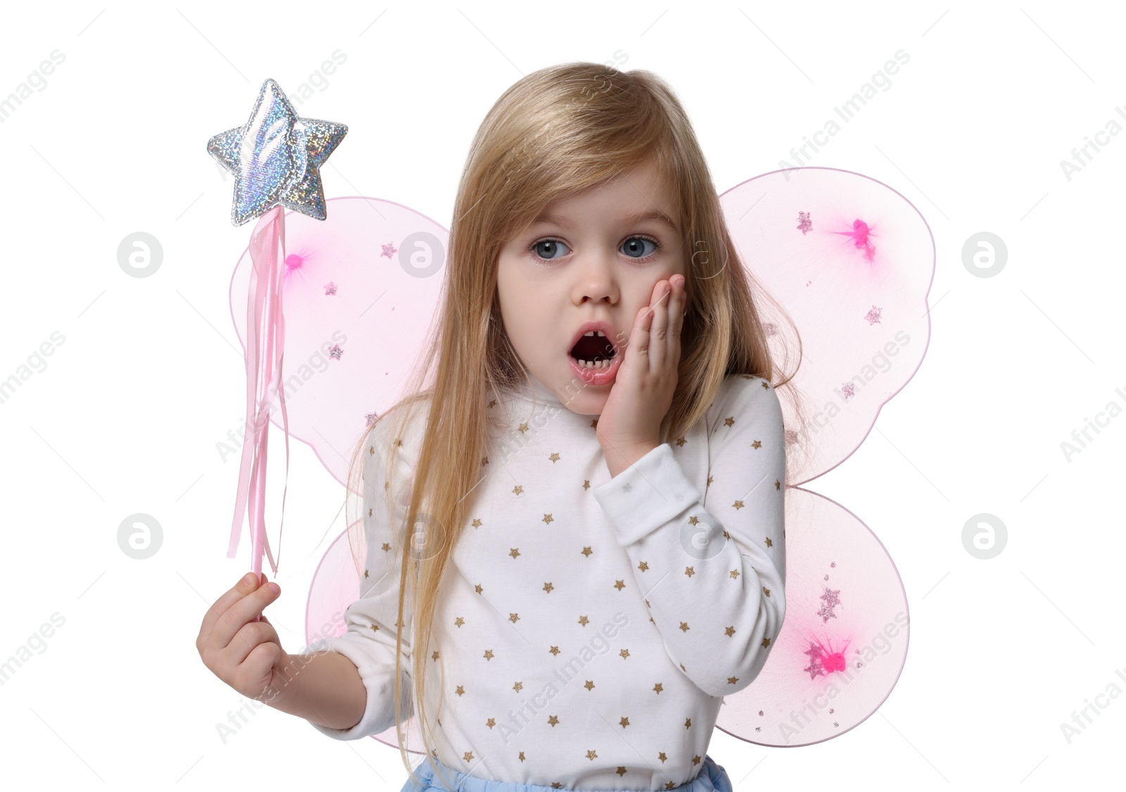 Photo of Surprised little girl in fairy costume with pink wings and magic wand on white background