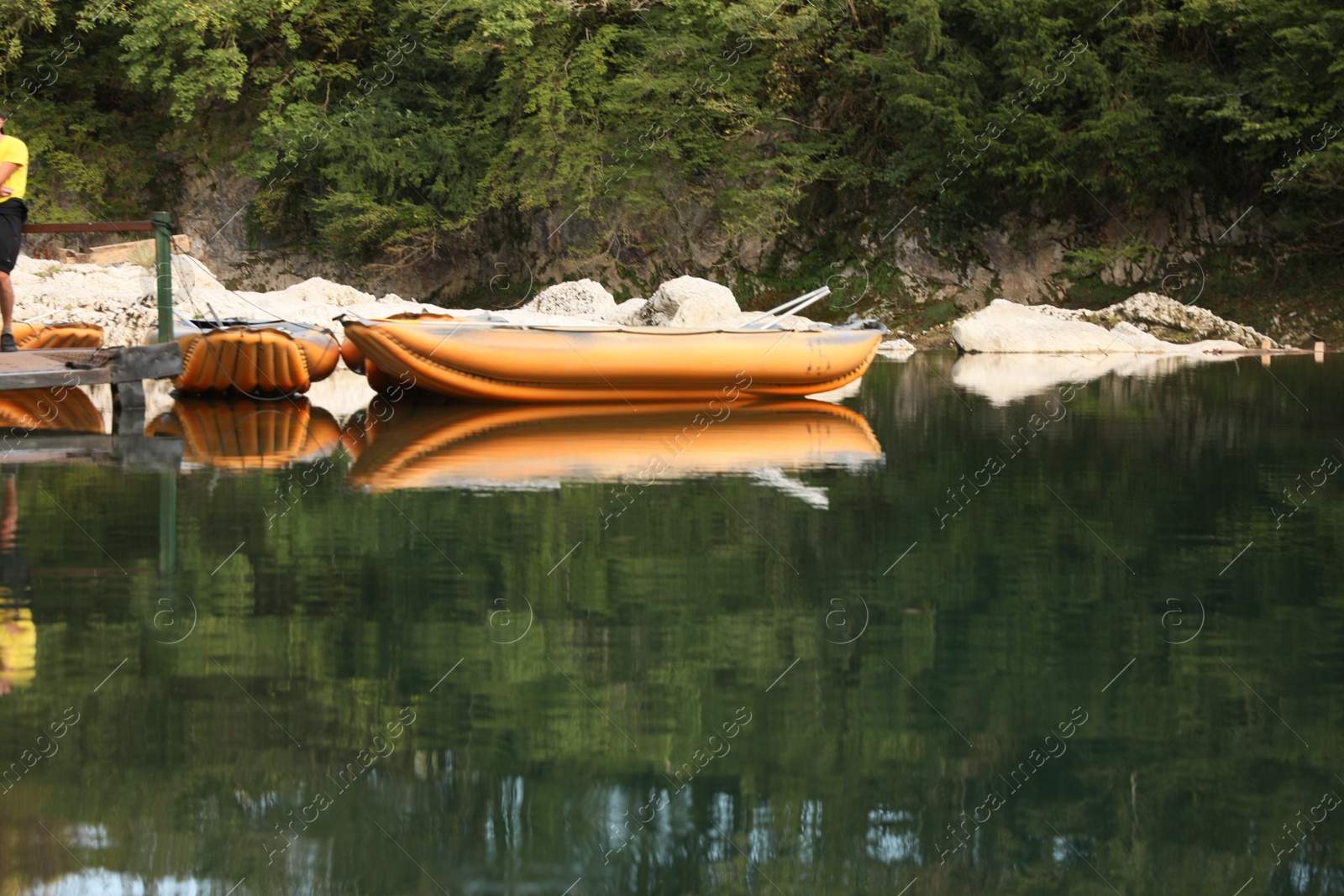 Photo of Boats on lake near shore in park