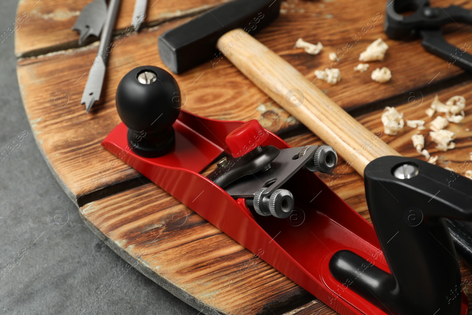 Photo of Set of modern carpenter's tools on grey table