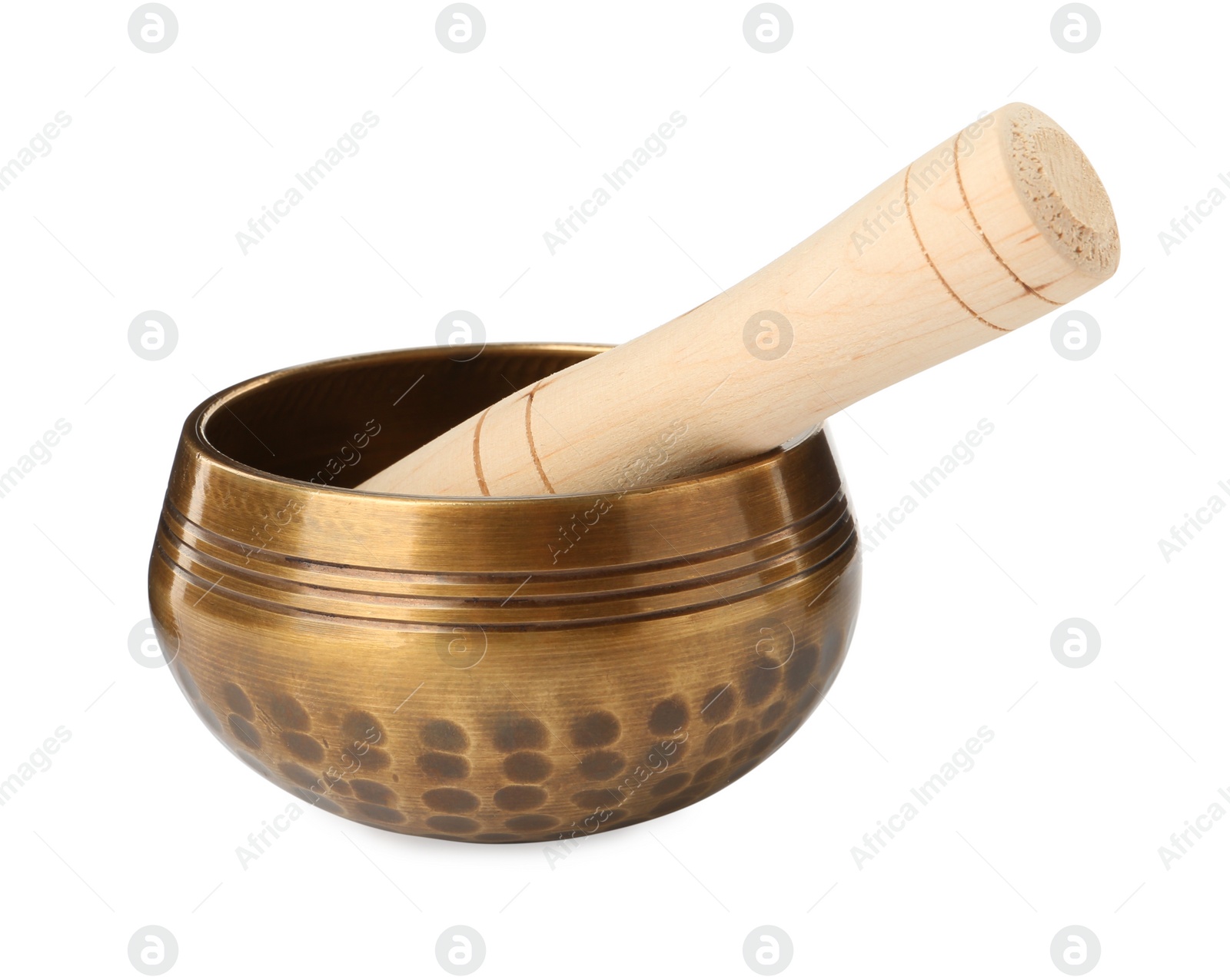 Photo of Golden singing bowl with mallet on white background. Sound healing