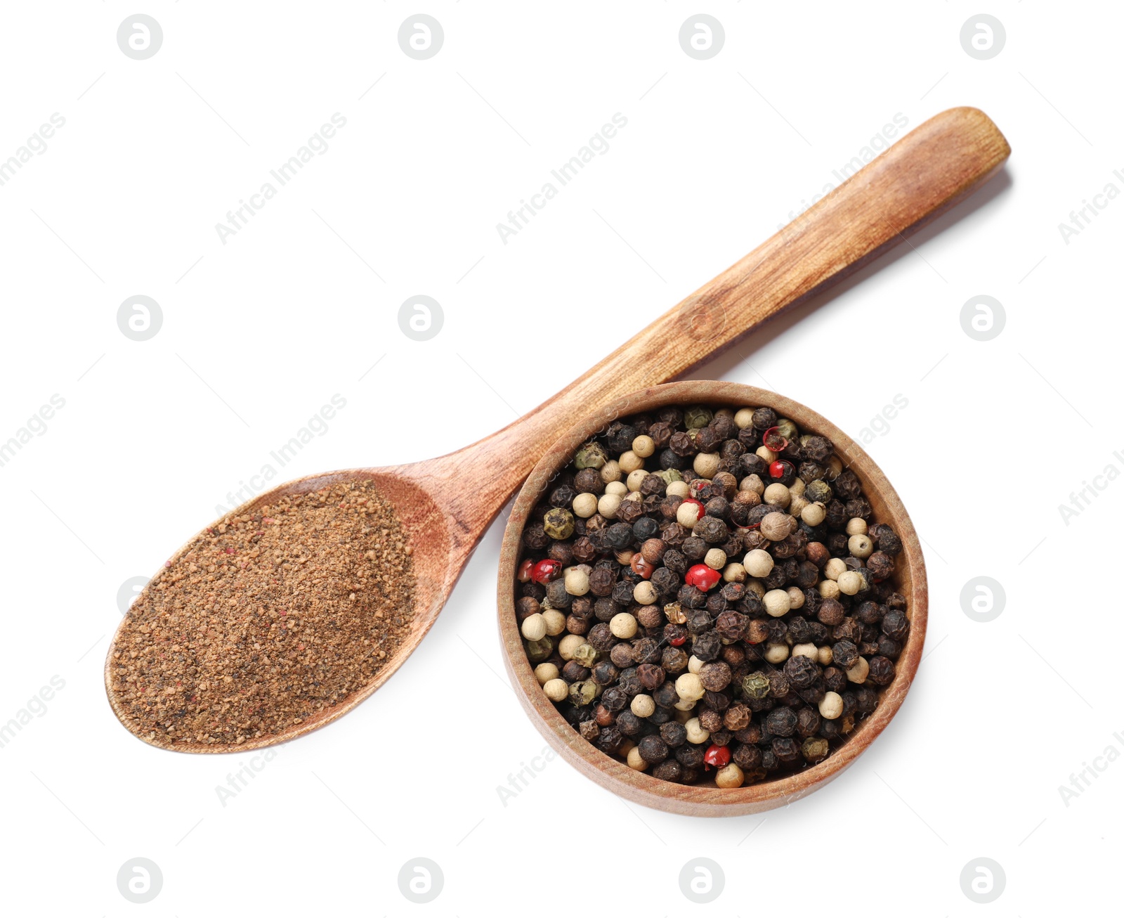 Photo of Aromatic spices. Different ground and whole peppers isolated on white, top view