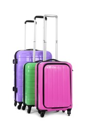 Image of Stylish suitcases packed for travel on white background