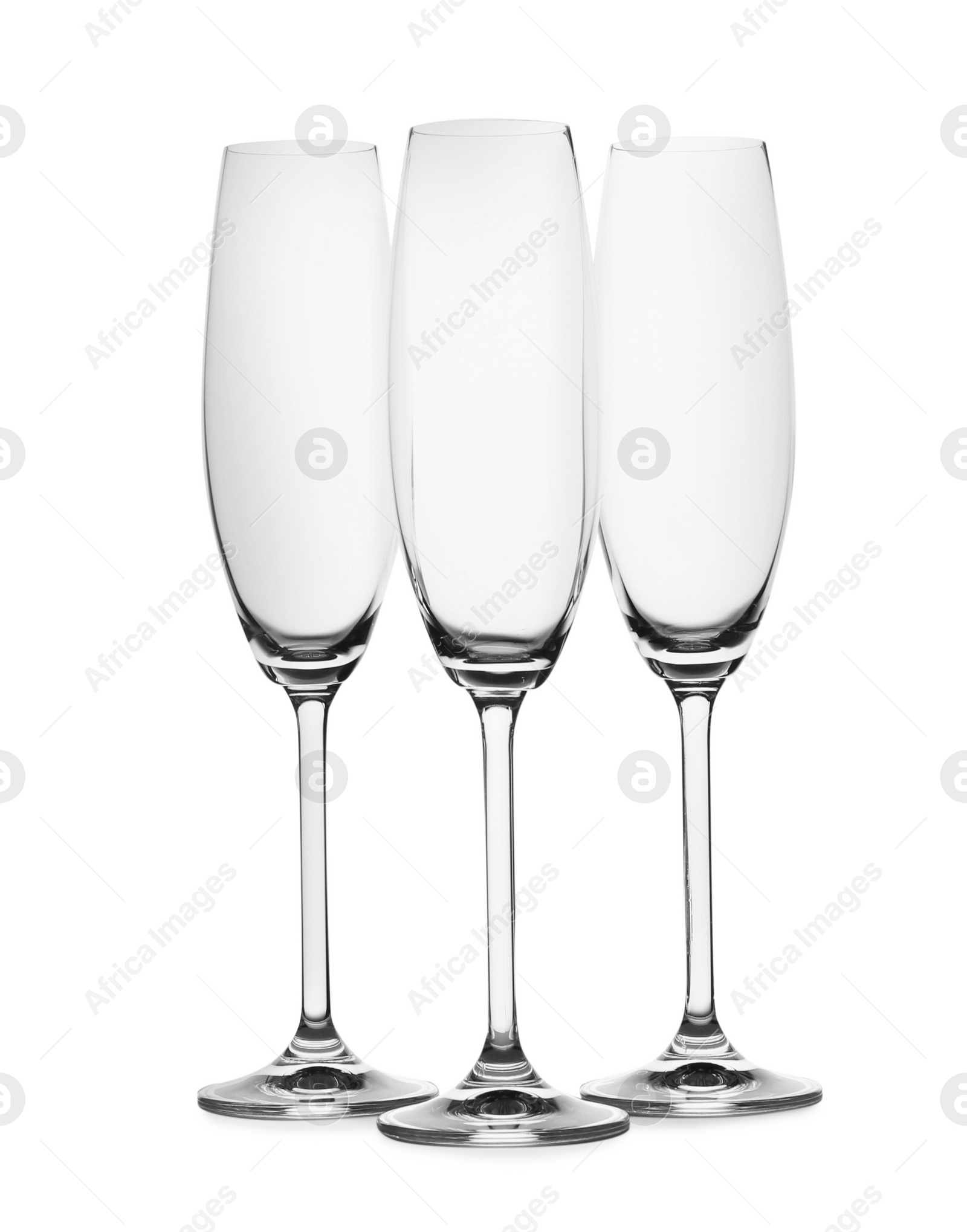 Photo of Set of champagne glasses isolated on white