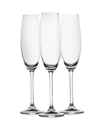 Photo of Set of champagne glasses isolated on white