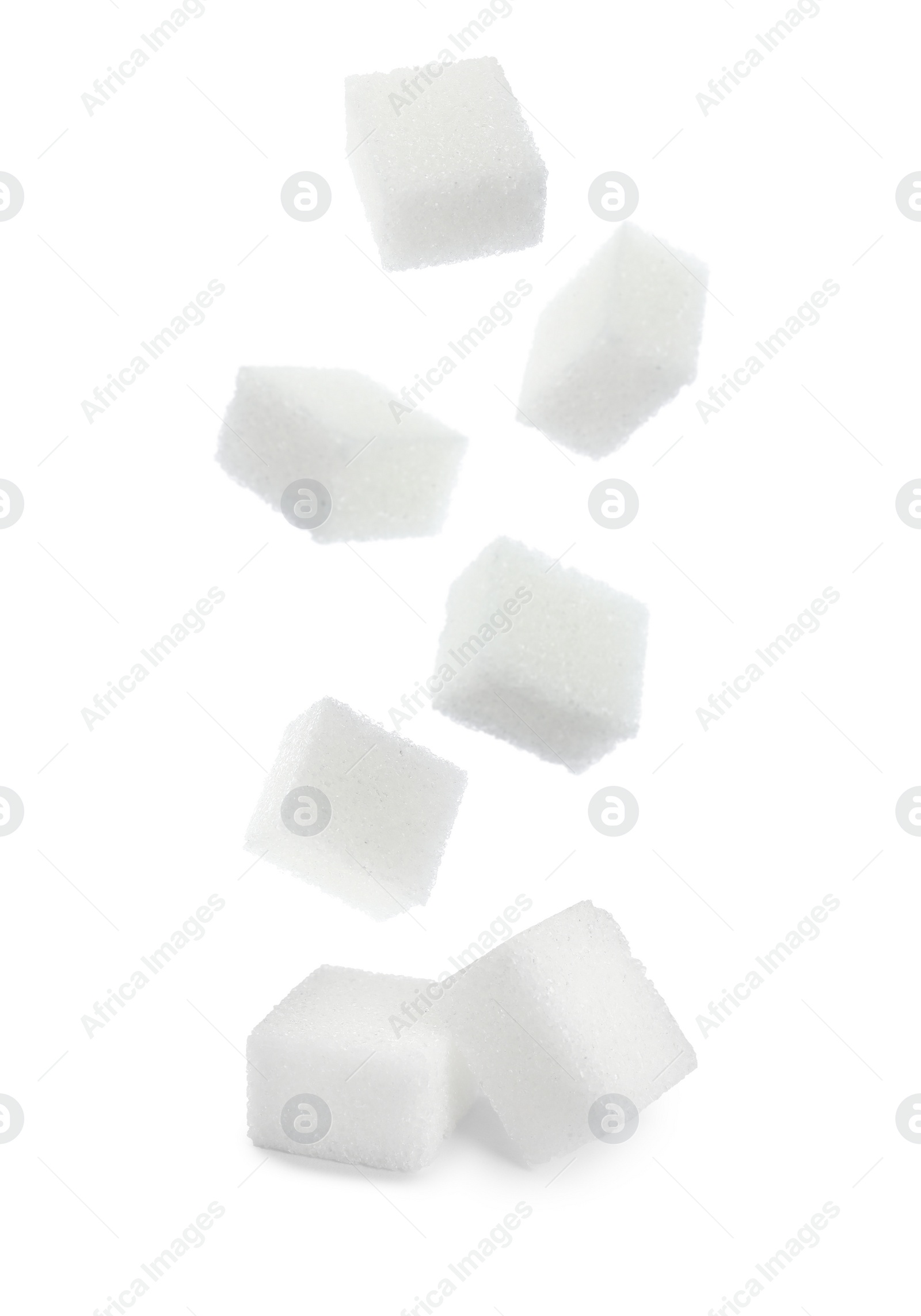 Image of Flying cubes of sugar on white background